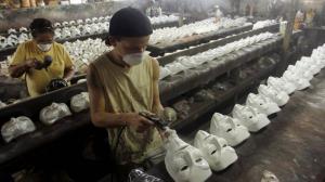 guy fawkes masks in sweatshop